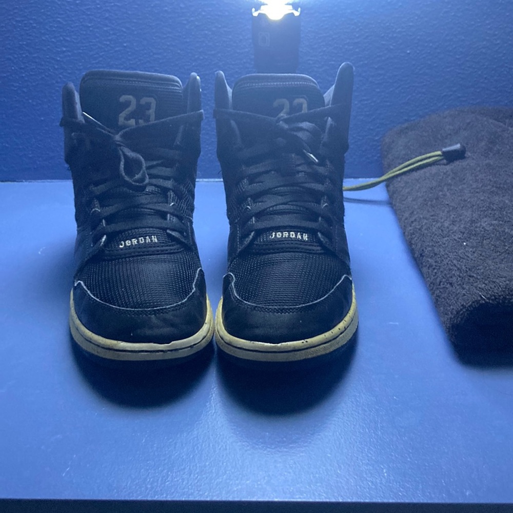 Size 6.5 and black Jordan 1 flight 4